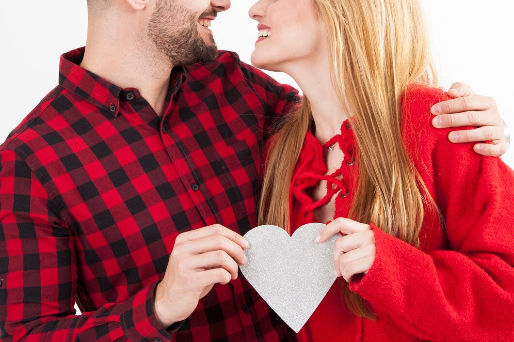 crop-couple-with-paper-heart_23-2147737276.jpg